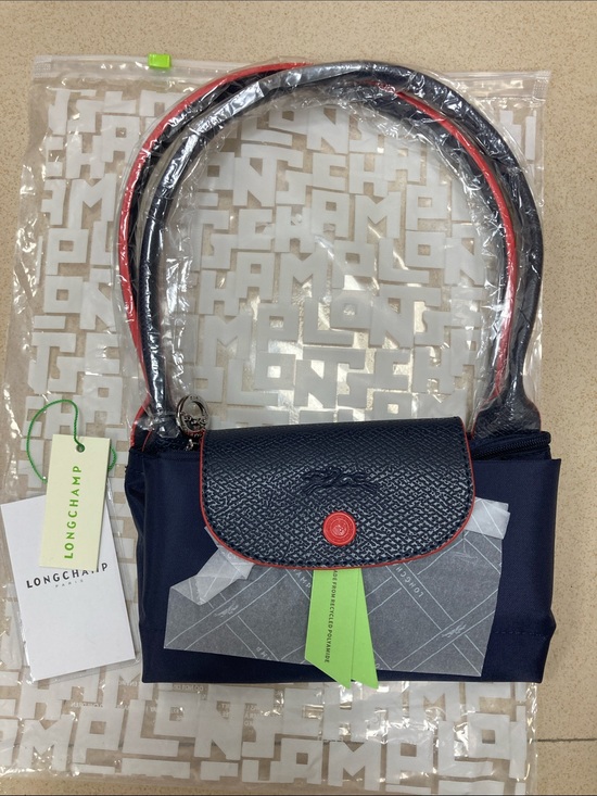 Longchamp Handbags - Longchamp navy shoulder bag with red trim